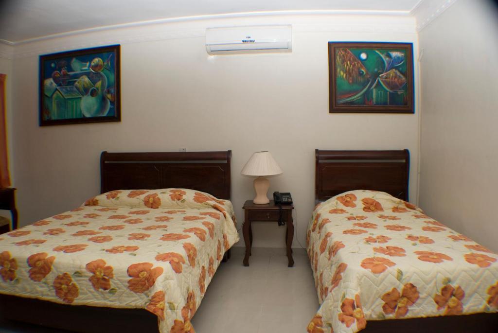 Hotel Luis V Санто Доминго Стая снимка